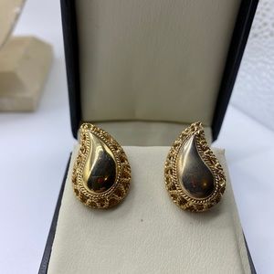 Gold tone pierced earrings
